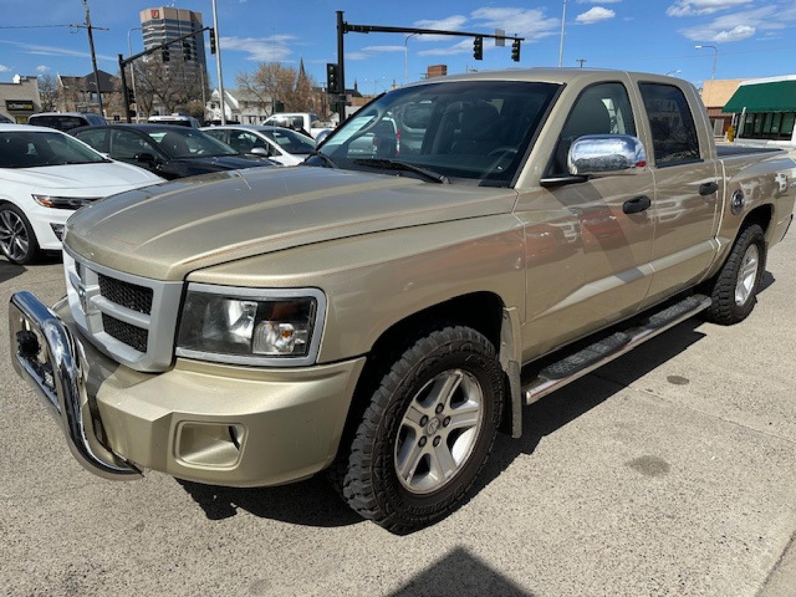 2011 /BEIGE Dodge Dakota SLT (1D7RW3GK3BS) with an 3.7 V6 engine, Automatic transmission, located at 3200 1st Avenue North, Billings, MT, 59101, (406) 245-9055, 45.779270, -108.510742 - Very Nice 4 Door Pickup with A Ton of Options! Power Windows, Power Door Locks, Remote Key Entry, Rugged Terrain Tires, Tilt Steering Column, Cruise Control, 4X4, Running Boards, Tonneau Cover, Towing, Custom Bumper Guard and Only 79,000 Miles. CarFax Dealer Auto Brokers of Montana/AA&A Auto Renta - Photo #0